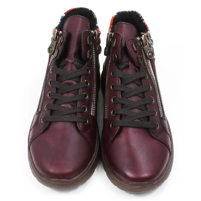 Maroon ankle boots with zippers and knitted ankle cuffs on a white background