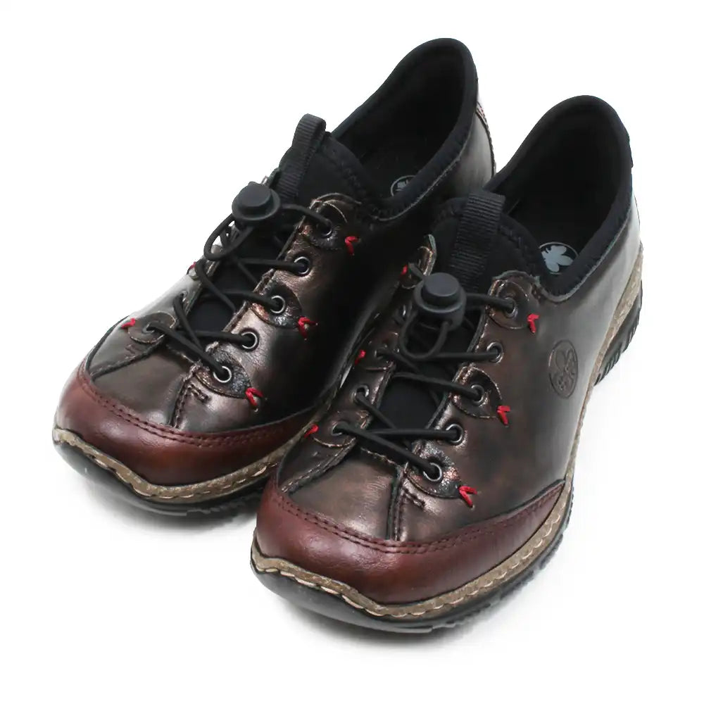 A pair of dark brown leather lace-up shoes with black laces, black elastic ankle straps, and small red stitching accents, shown on a white background.