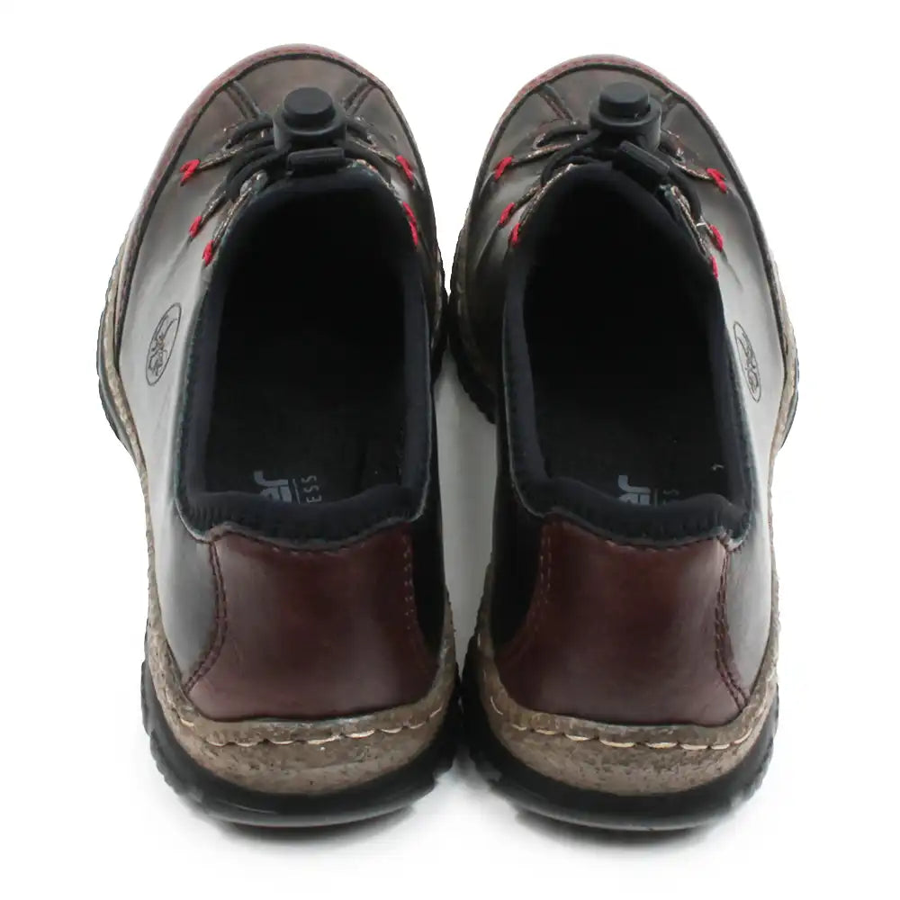 A pair of women's lace-up shoes shown from the back, featuring dark brown leather uppers with reddish-brown heel panels, black laces, and cork-wrapped midsoles on a white background.
