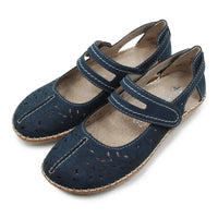 Navy blue sandals with straps on white background.