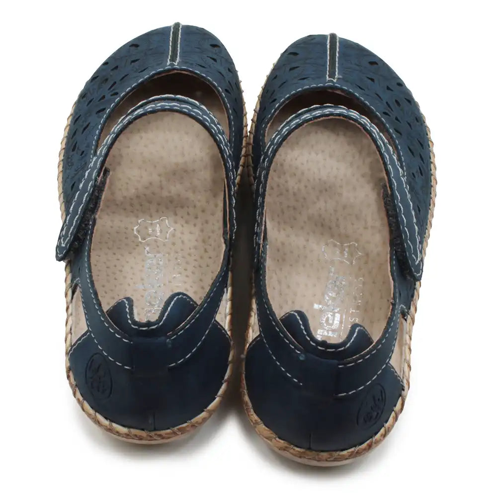 Navy blue sandals with straps on white background.
