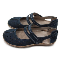 Navy blue sandals with straps on white background.