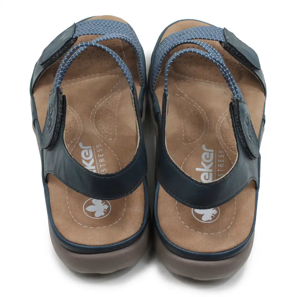 Blue fabric strapped sandals on a white background.