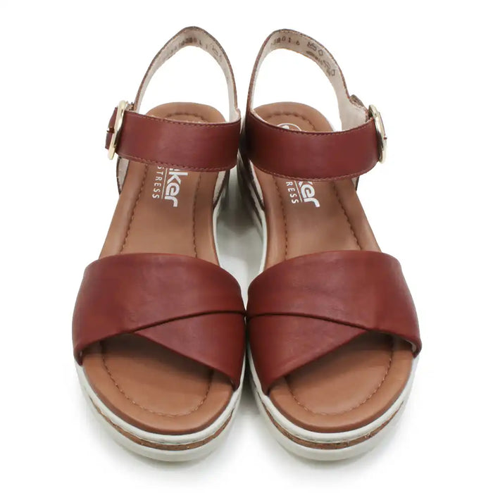 Pair of brown sandals with a visible brand logo on a white background