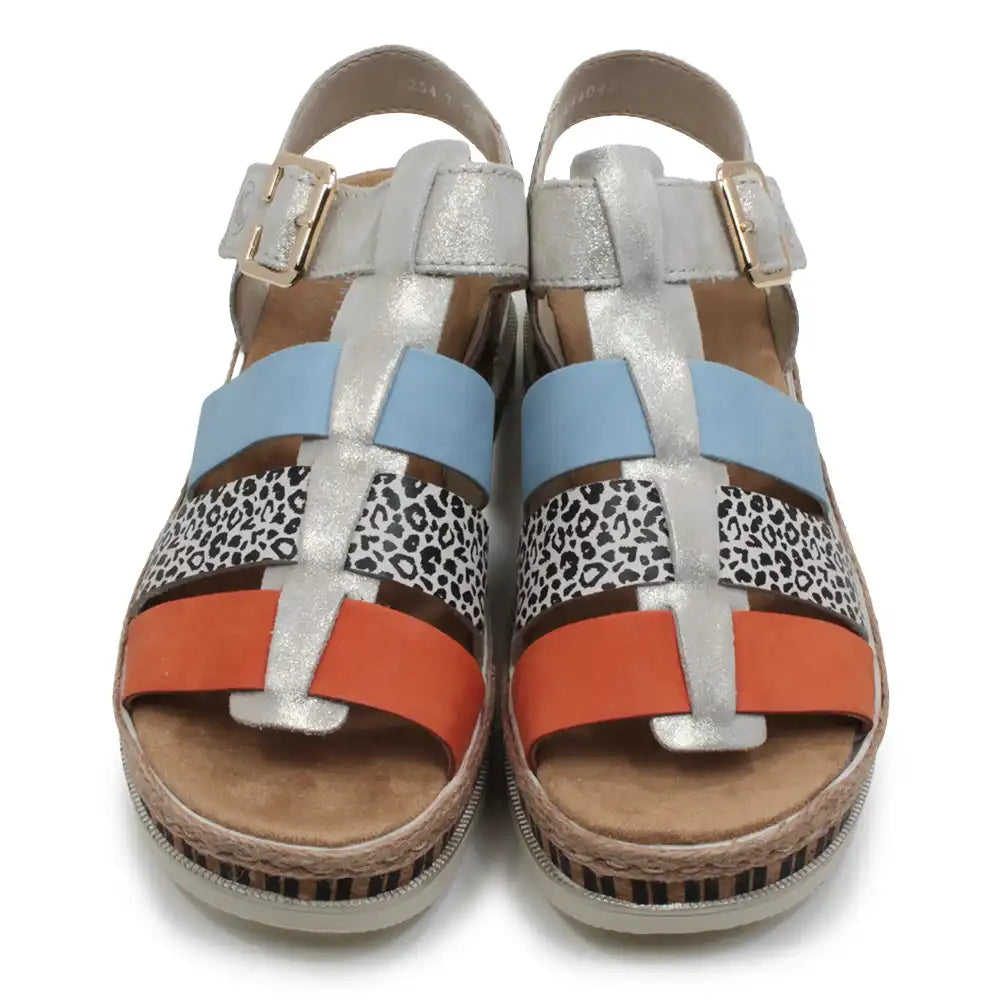 Colorful sandals with patterned straps on a white background