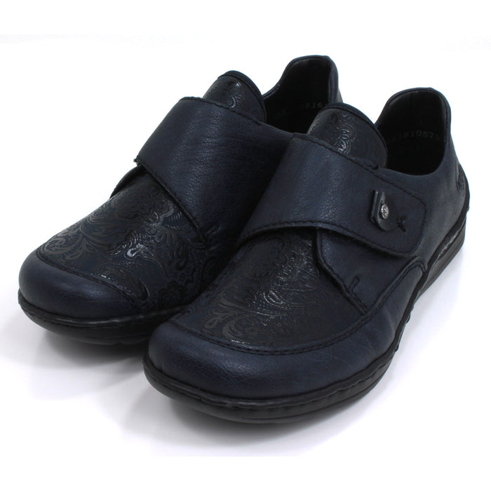 Rieker dark blue Velcro fastening shoes with elasticated patterned panel. Flats with slight wedge heels. Angled view.