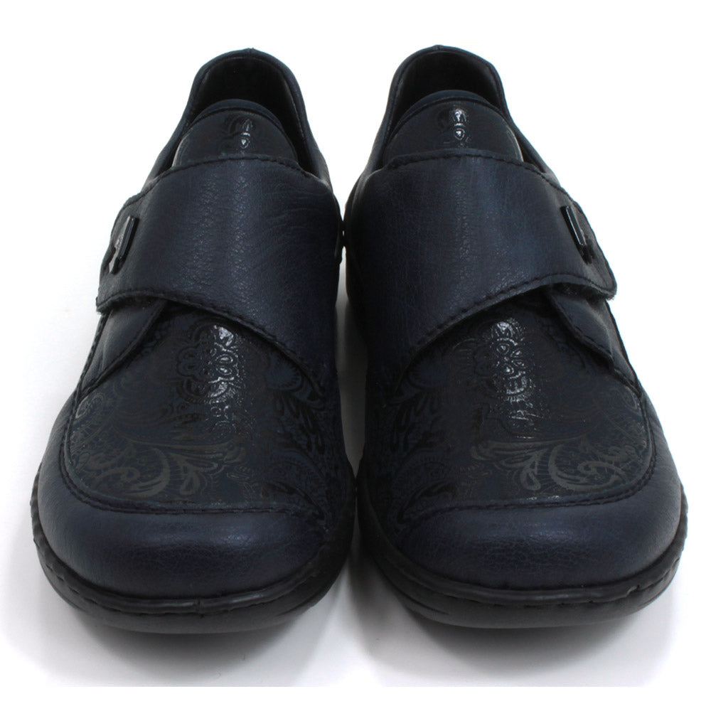 Rieker dark blue Velcro fastening shoes with elasticated patterned panel. Flats with slight wedge heels. Front view.