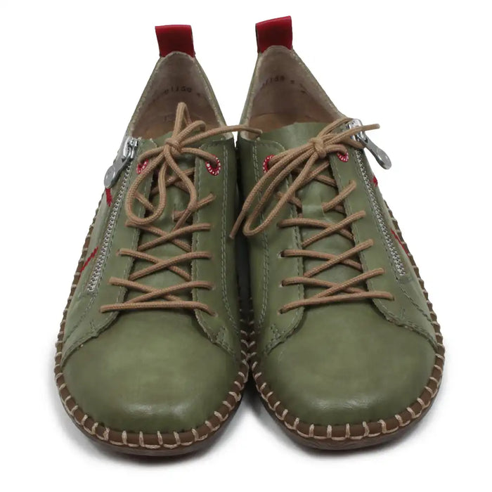 Pair of green leather shoes with brown laces on a white background