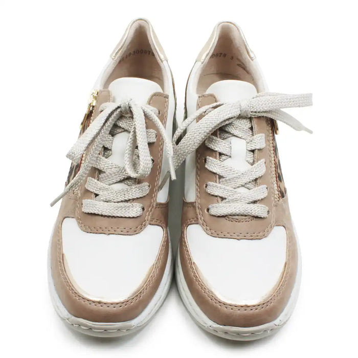 Pair of beige and white sneakers on a white background
