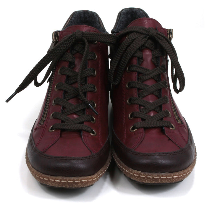 A pair of dark red Rieker high-top ankle boots with burgundy accents, featuring a lace-up closure and a side zip.