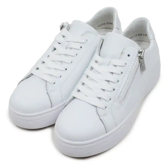 White sneakers with zippers on a white background