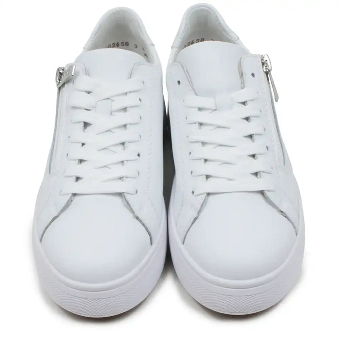 Pair of white sneakers with zippers on a white background
