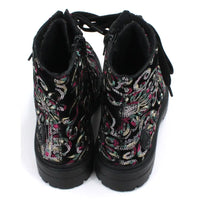 Black sequined combat style boots.