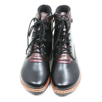 A pair of lace-up ankle boots with black leather uppers, dark brown leather panels at the collar and toe, black laces, and a light brown sole, shown against a plain white background.