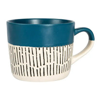 Blue and white mug with black pattern on a white background