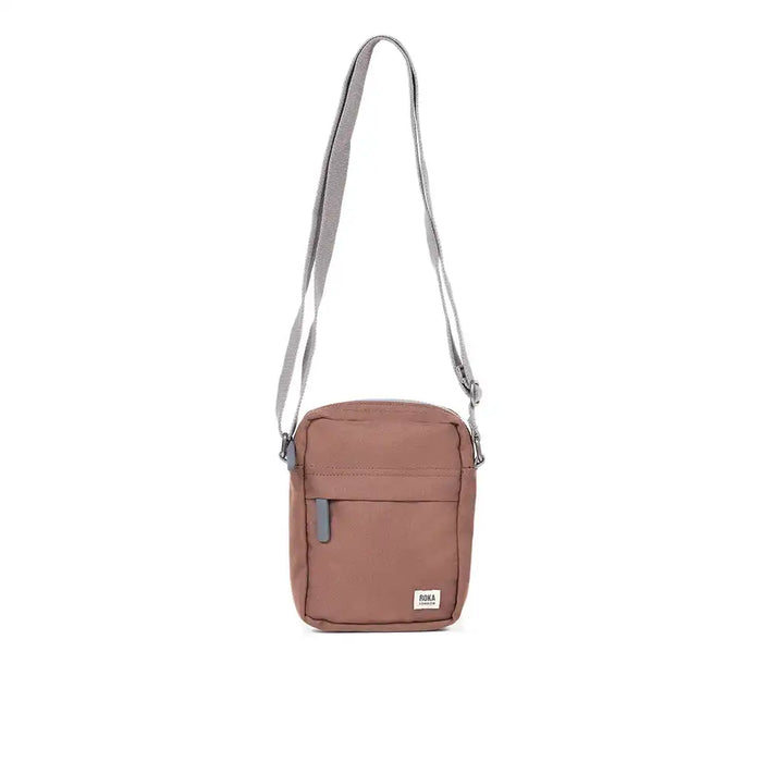 Brown crossbody bag with a strap on a white background