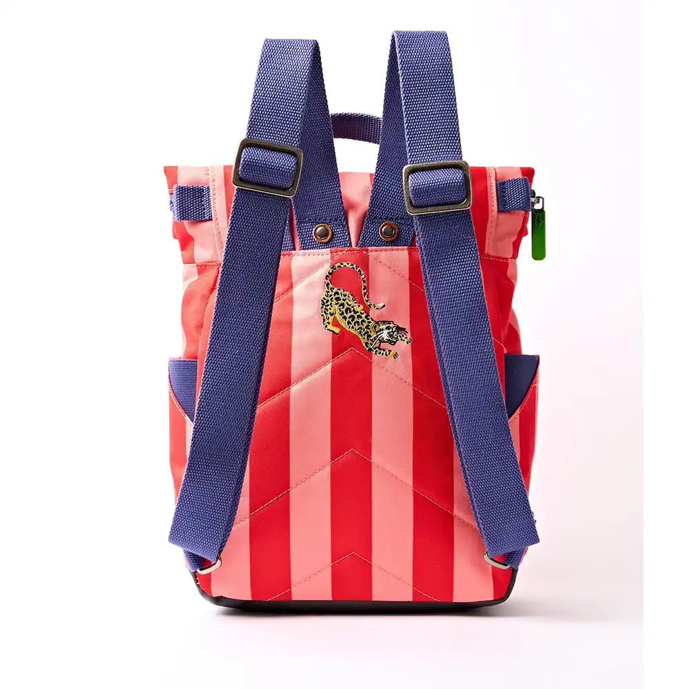 Back of pale pink and red stripey backpack with purple handle and lime green zip toggles. Leopard embroidered on the back. 