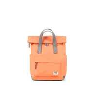 Orange backpack with gray straps on a white background