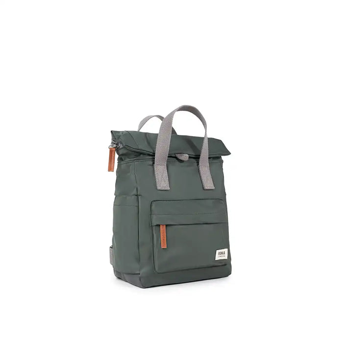 Green backpack with gray straps on a white background