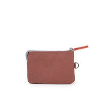 Small brown zippered pouch with a gray top section on a white background