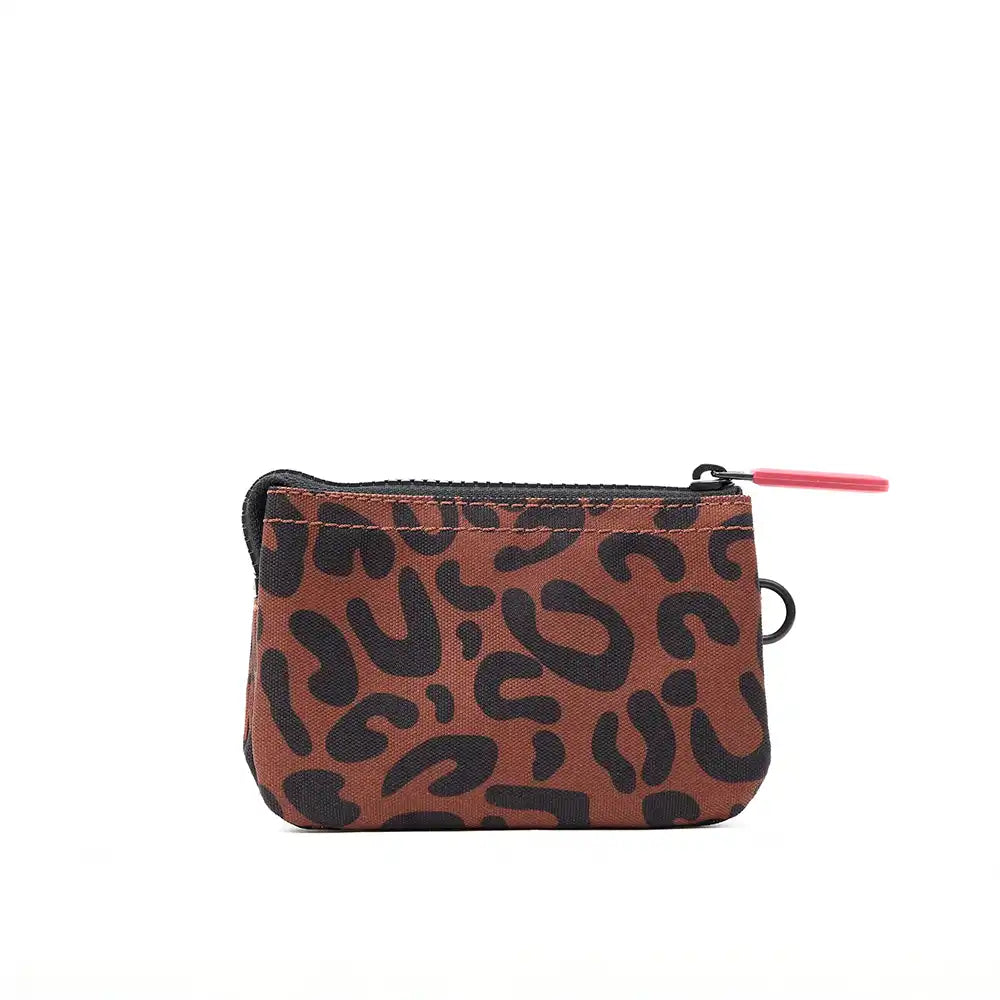 Small brown pouch with black abstract pattern on a white background