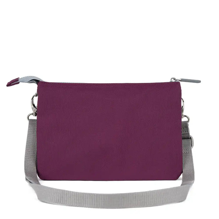 Purple shoulder bag with a gray strap on a white background