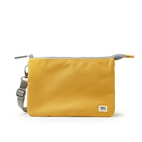 Yellow pouch with a gray strap on a white background
