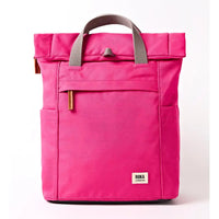 Front of a fuchsia coloured backpack with grey straps.