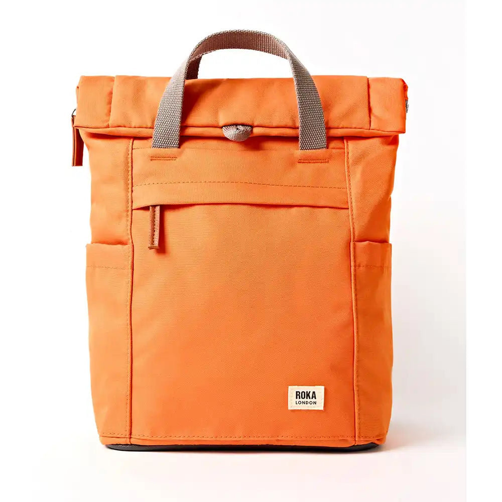Orange backpack with a ROKA brand logo on a white background
