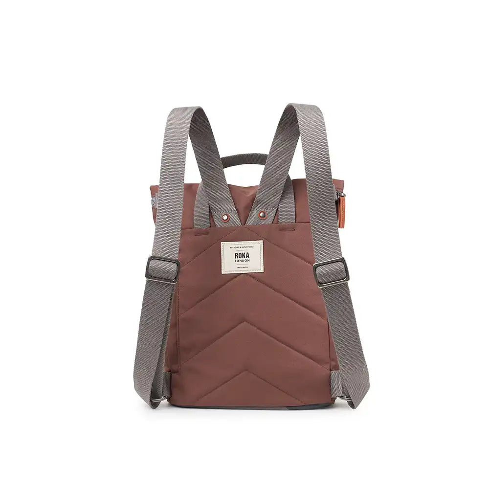 Brown backpack with gray straps on a white background