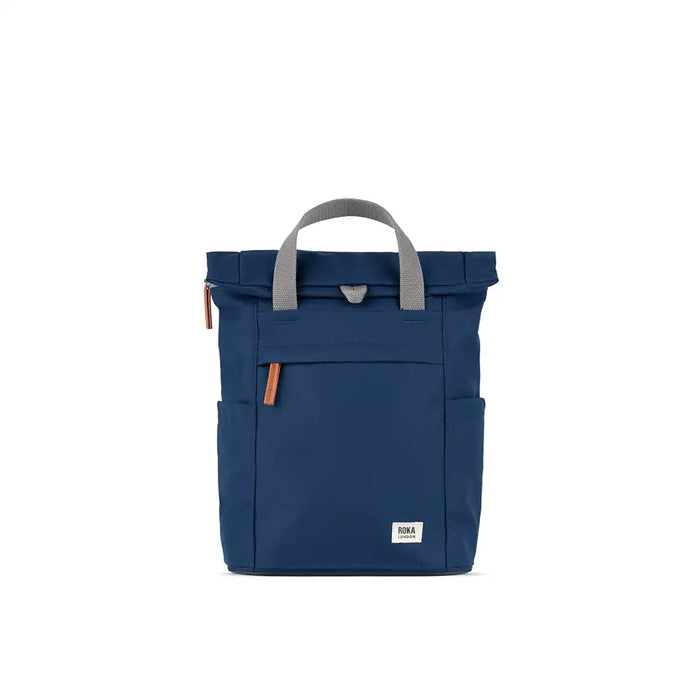 Blue backpack with gray handles on a white background