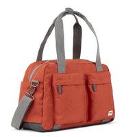 Orange bag with gray straps on a white background