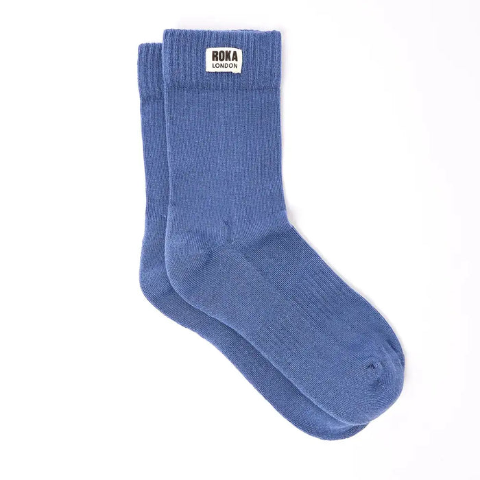 Crew style sock with 'Roka London' badge on the cuff. In a Blue colour.