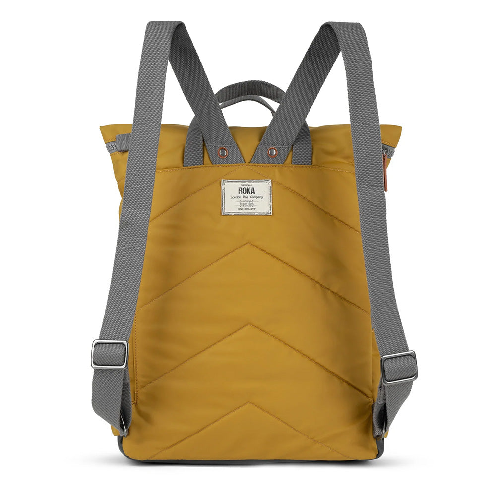 Yellow backpack with gray straps on a white background