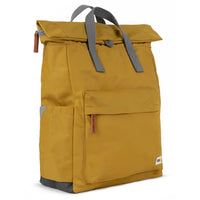 Yellow backpack with gray straps on a white background