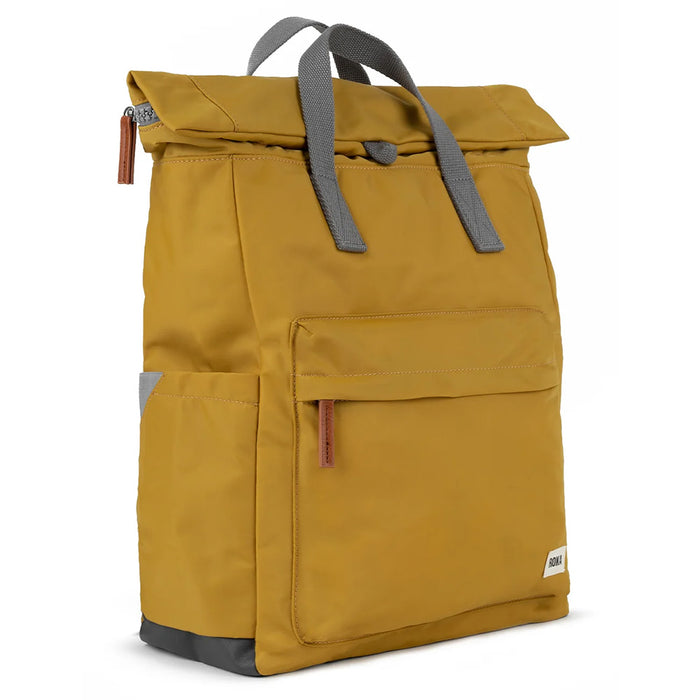 Yellow backpack with gray straps on a white background