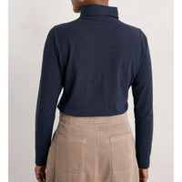 Seasalt Cornwall long sleeve roll neck top in maritime blue. Back view. 