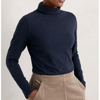 Seasalt Cornwall long sleeve roll neck top in maritime blue. Front view. 