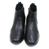 Shoe Tree black Chelsea style boots with low wedge heels. Zip fastening. Front view.