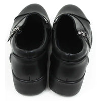 Black low heeled shoes with side short zips. Back view.