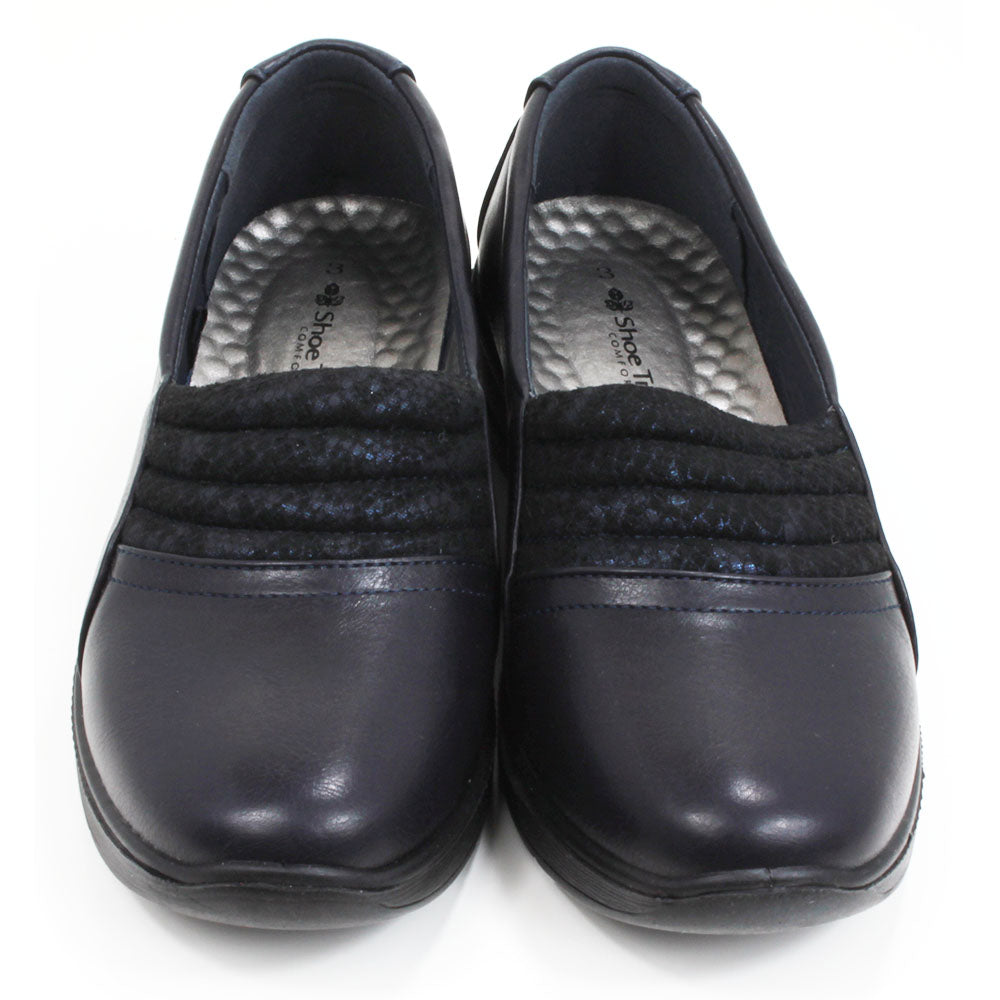 Shoe Tree Irene navy leather look shoes. Slip on with silver insoles. Low heels. Front view.