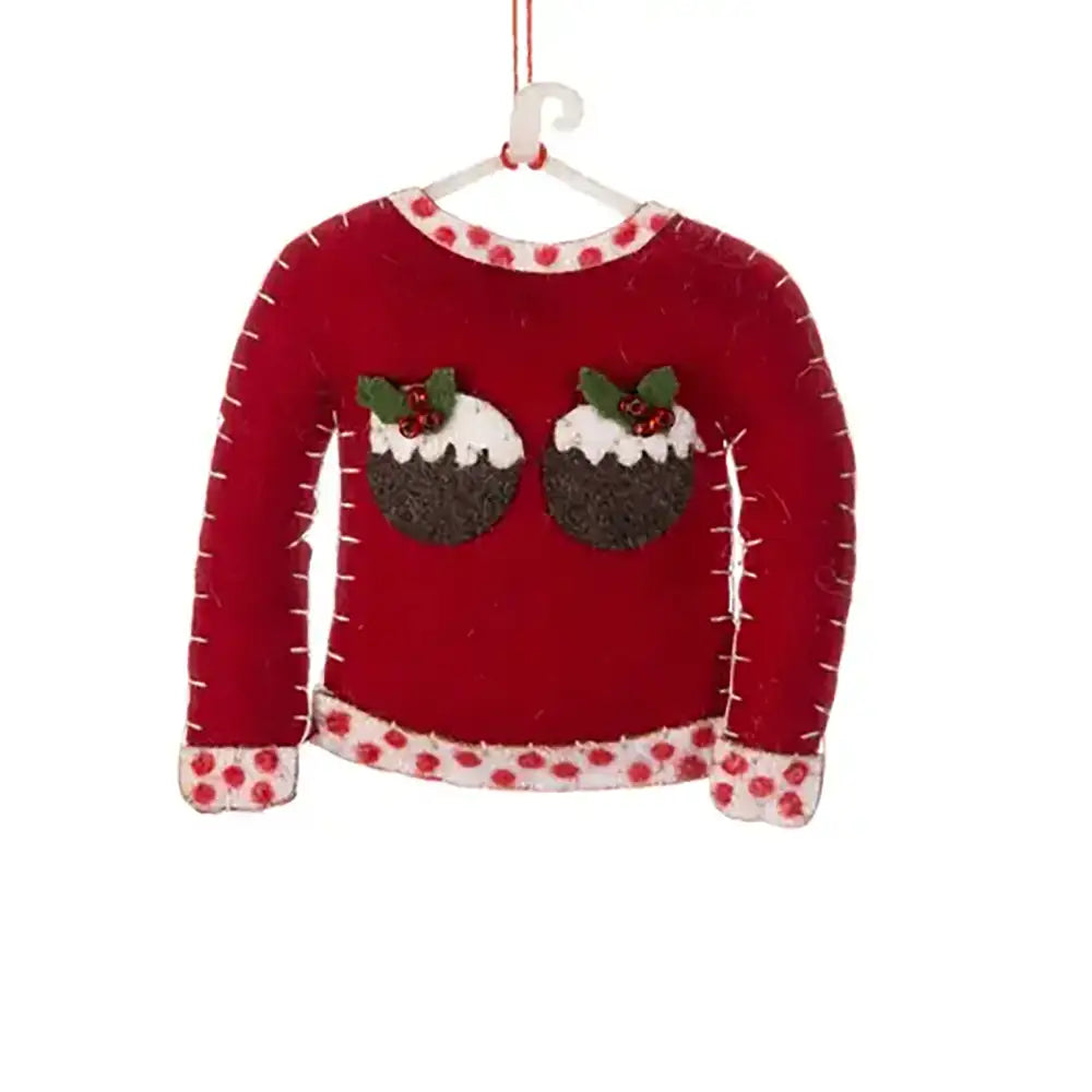 Christmas decoration of a red sweater with Christmas pudding design on a white background