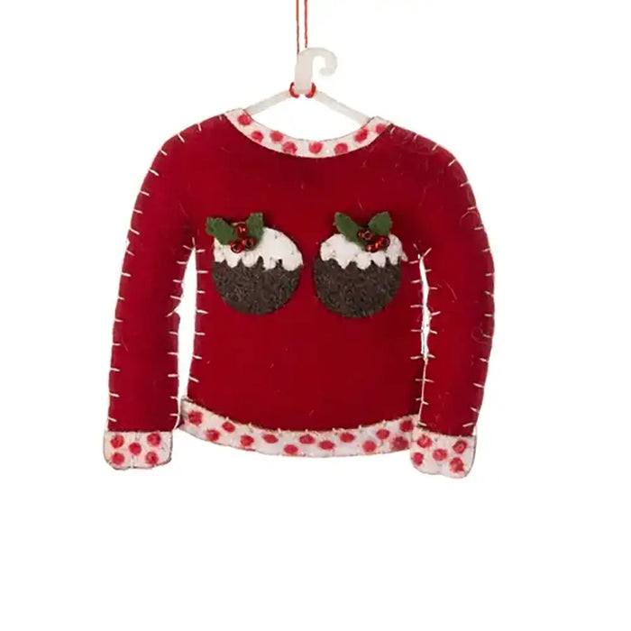 Christmas decoration of a red sweater with Christmas pudding design on a white background