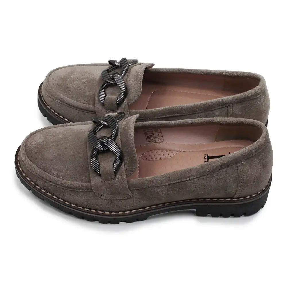 Pair of brown loafers with braided detail on a white background