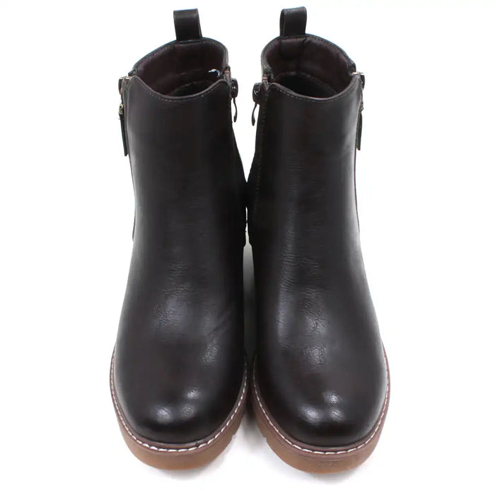 Dark brown Chelsea style ankle boots with light brown wedge soles and heels.