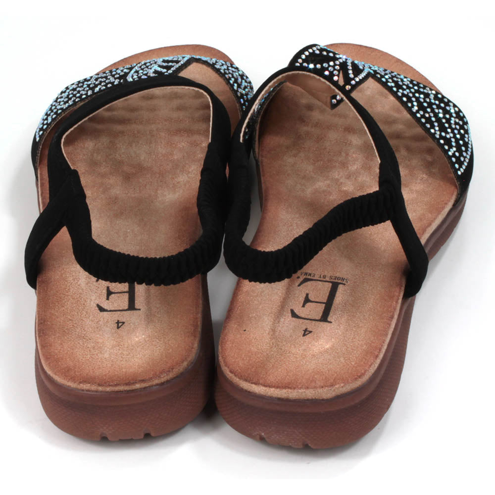 Black sandals decorated with diamantes. Elasticated black ankle strap. Tan, molded insoles. Back view.