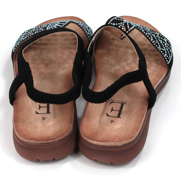 Black sandals decorated with diamantes. Elasticated black ankle strap. Tan, molded insoles. Back view.