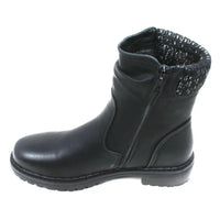 Black leather look ankle boot with grey and white knitted ankle cuff. Low heel. View showing zip fastening.