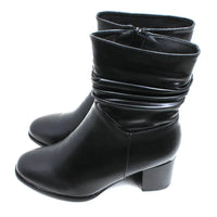 Shoes by Emma black ankle boots with ruched look. Cuban heels and round point toes. Side view.