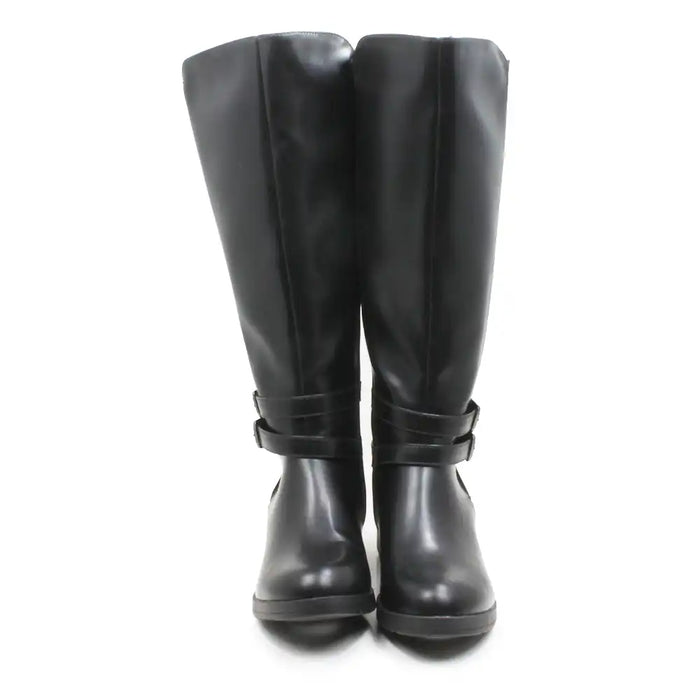 A pair of black leather knee-high boots with a strap detail around the ankle, shown from the front on a white background.
